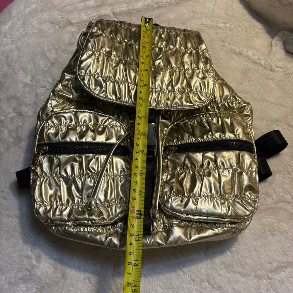 NWT Madden Girl Backpack Metallic Gold Quilted Drawstring Shiny Black Zip Straps